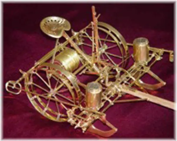 A rustic decorative piece with candle holders and woven twigs.