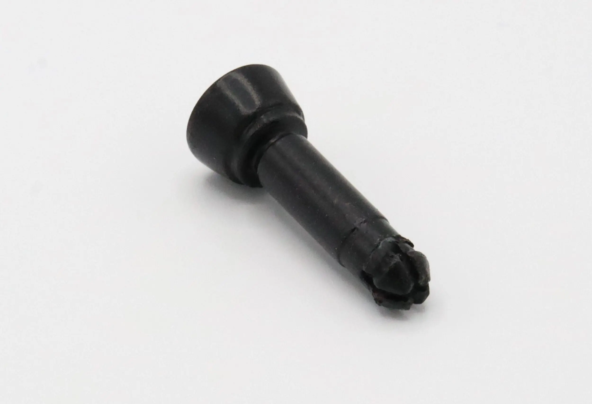 Black plastic valve stem for tires.