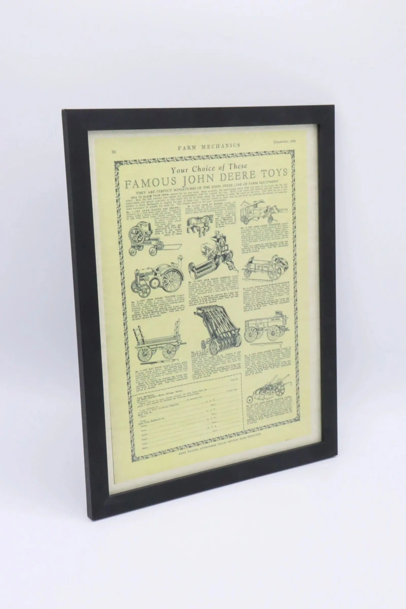 Framed vintage poster featuring humorous dog illustrations and captions.