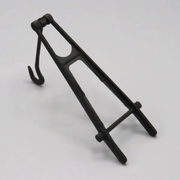 Black metal stand with a hook and support bars.