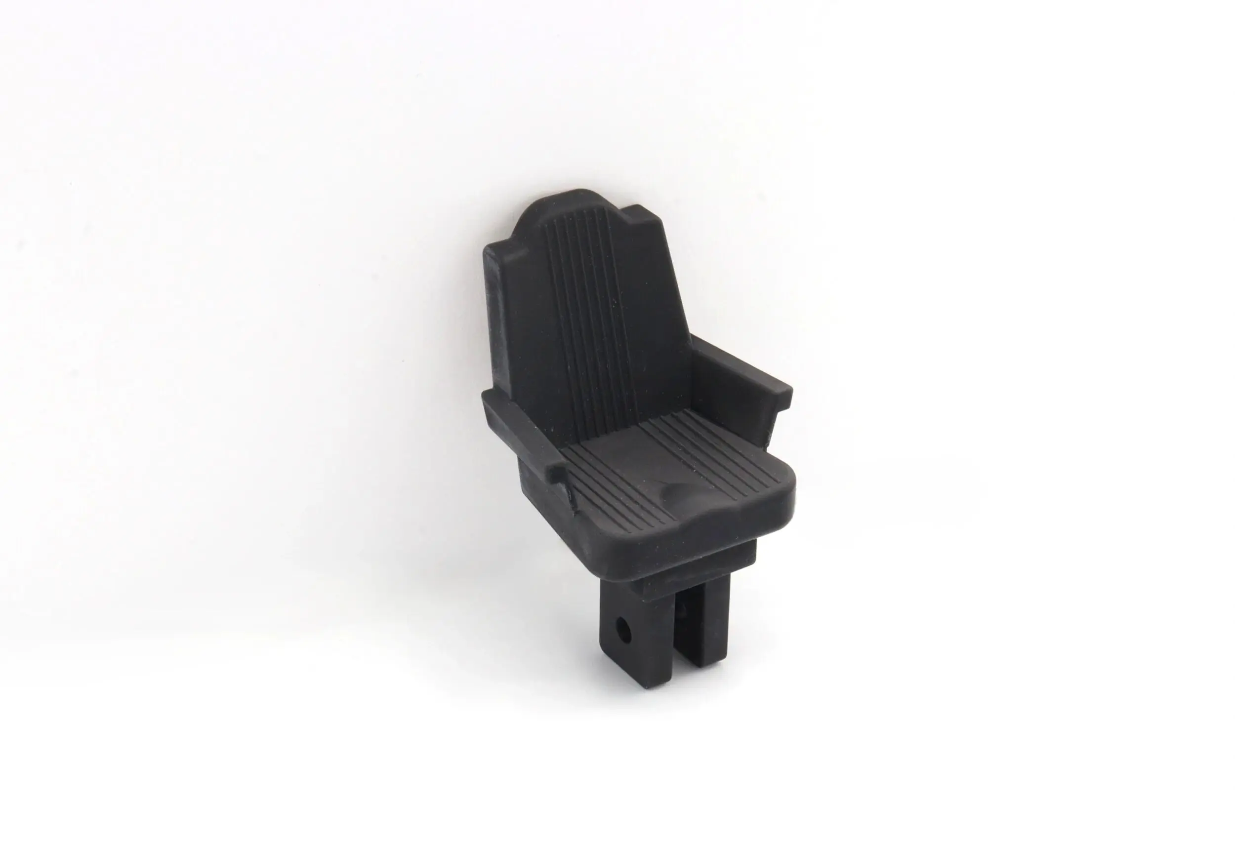 Black plastic LEGO chair piece with armrests and backrest.