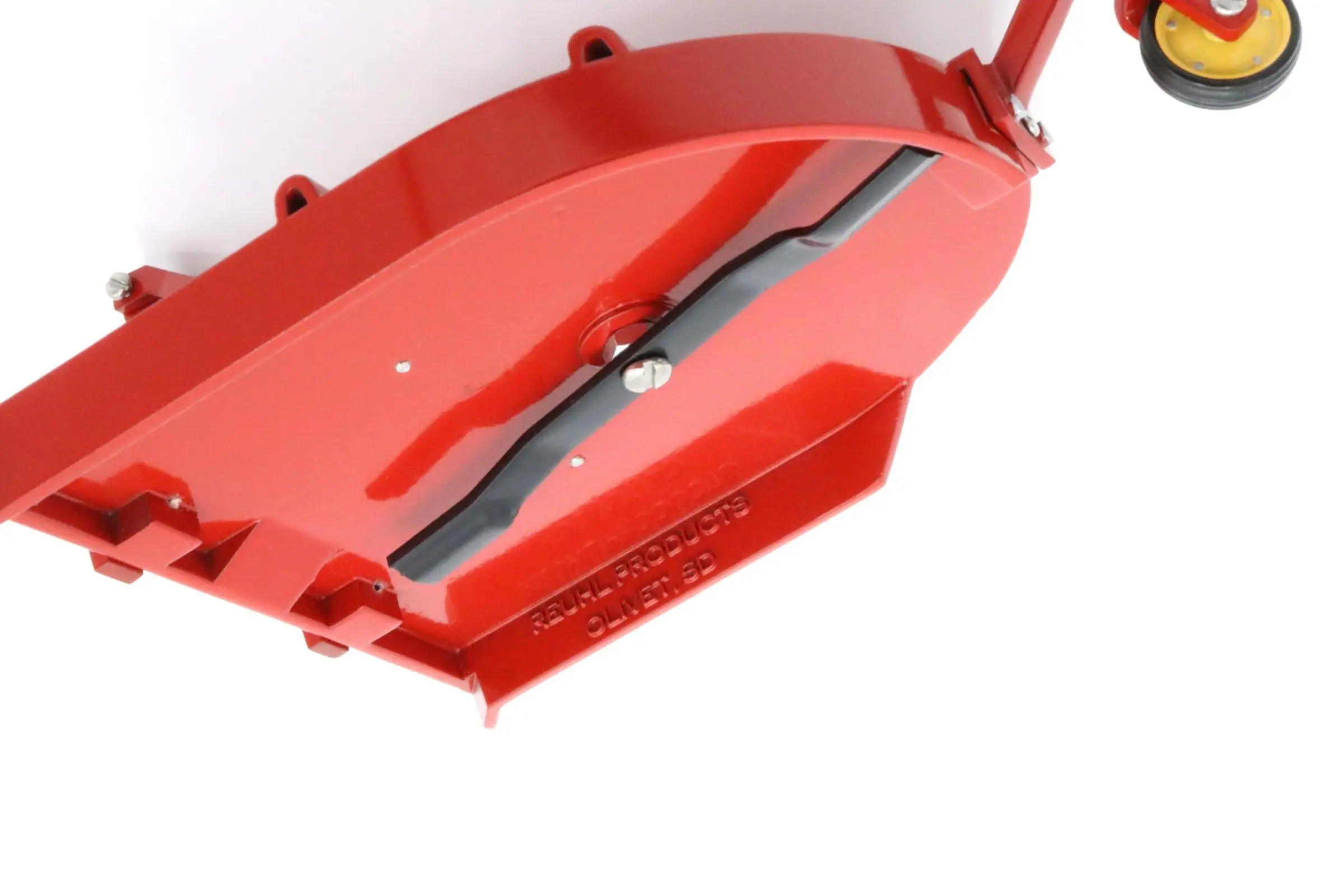 Red robotic lawn mower with visible cutting blades.