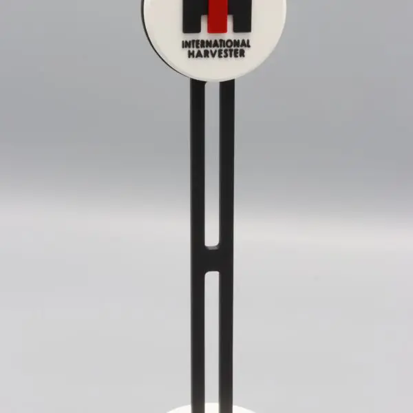 International Harvester logo on stand display.